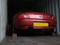 BMW Z3 secured in shipping container