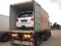 Container doors open, car all chocked secure