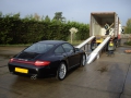 Porsche Carrera lined up ready for loading into shipping container